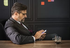 a man with her phone